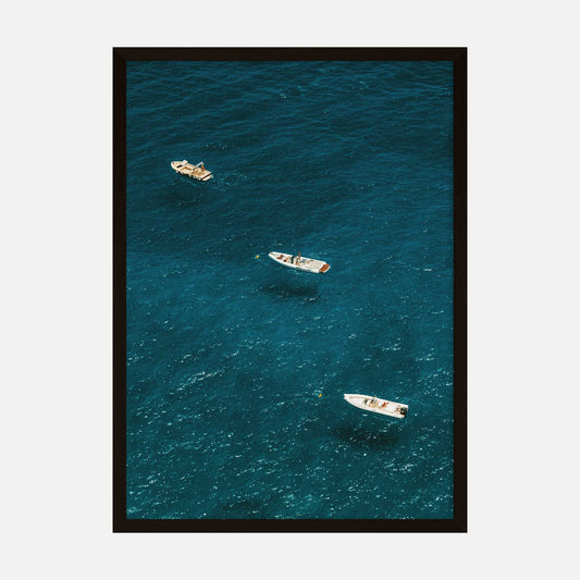 Aerial view art print of boats floating on the blue waters of the Amalfi Coast in Italy.