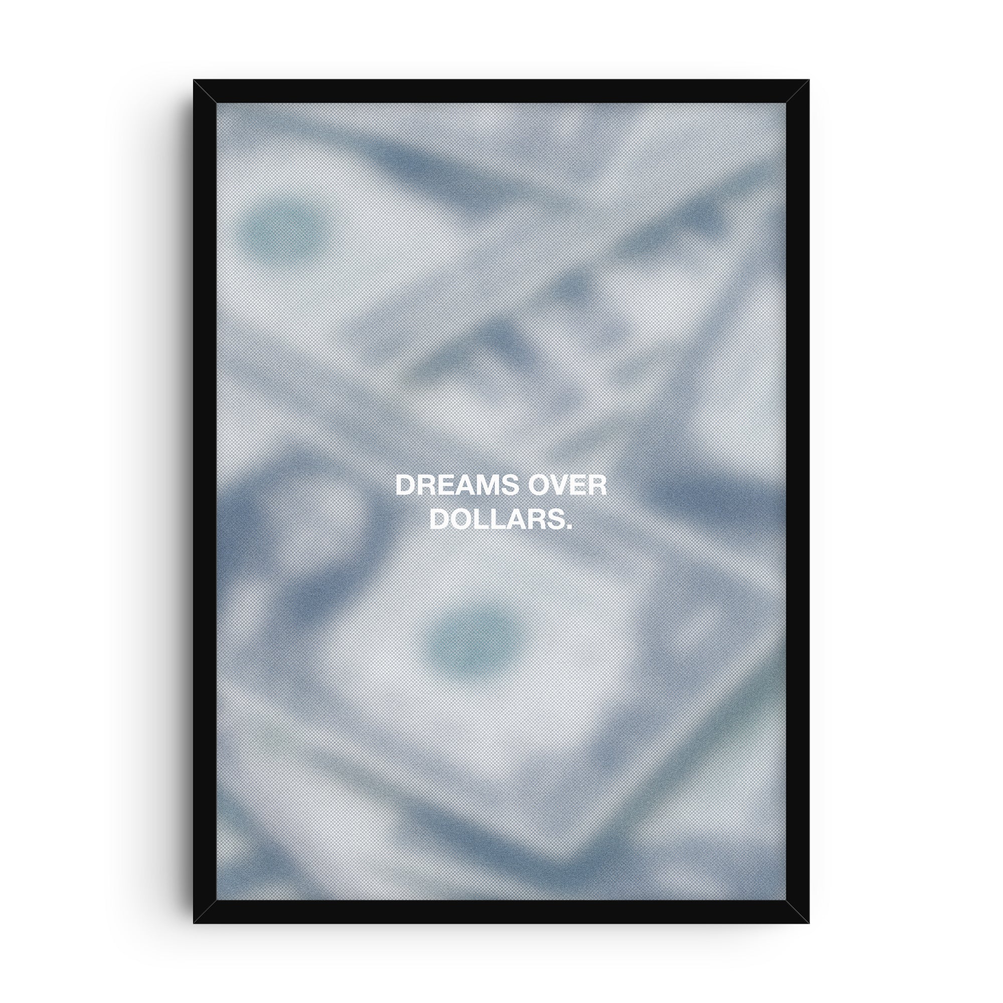 Minimalist motivational art print with the words “Dreams Over Dollars” in bold white text, placed over a blurred background of overlapping US dollar bills.