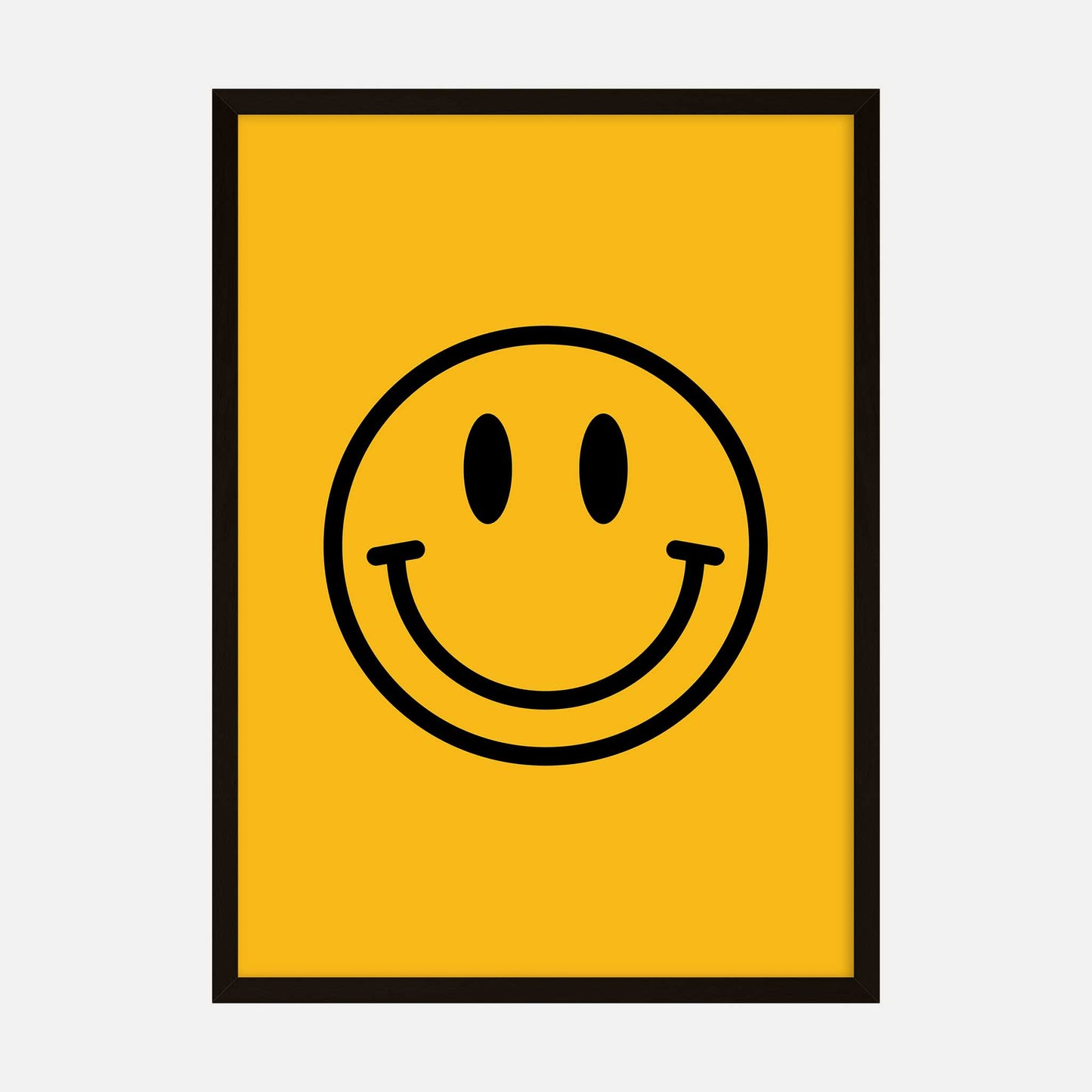 A yellow poster featuring a bold black happy face design, perfect for adding a touch of positivity to any space.