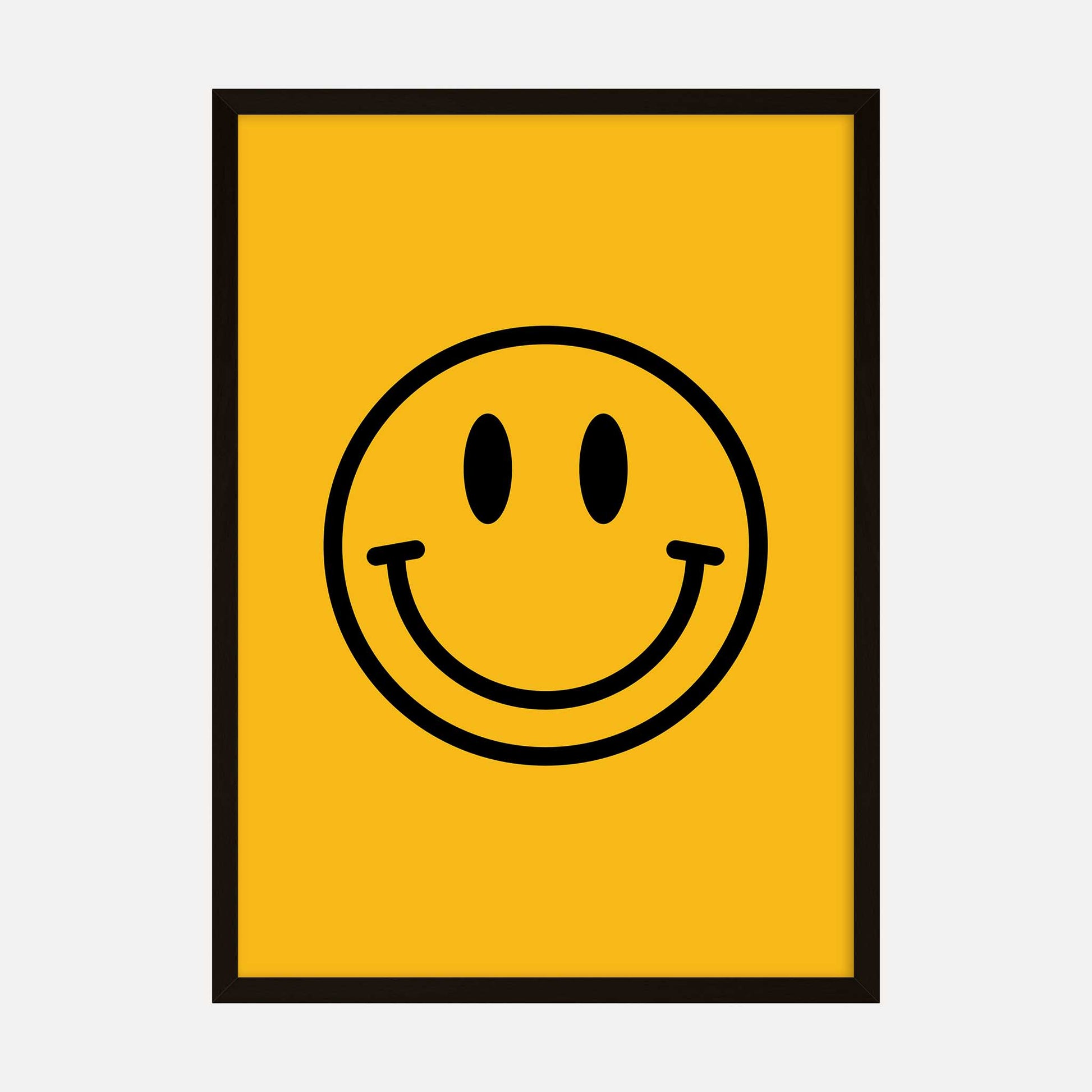 A yellow poster featuring a bold black happy face design, perfect for adding a touch of positivity to any space.