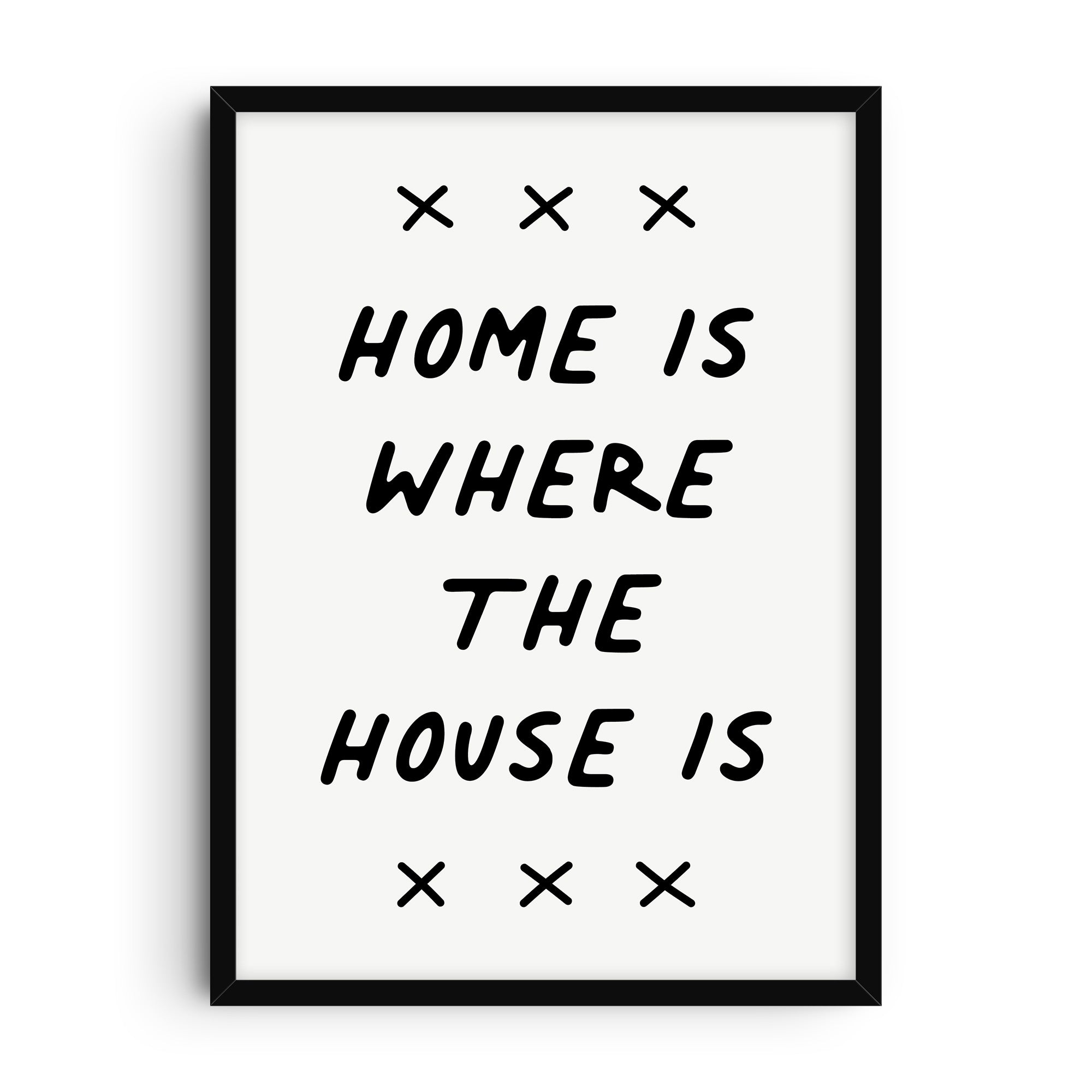 Minimalist typography art print with the phrase “Home is where the house is” in bold black lettering on a white background, accented with simple black X shapes.