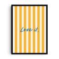 Minimalist art print with vertical yellow and white stripes and blue handwritten text “Love it.” centered on the design, modern typography wall art.
