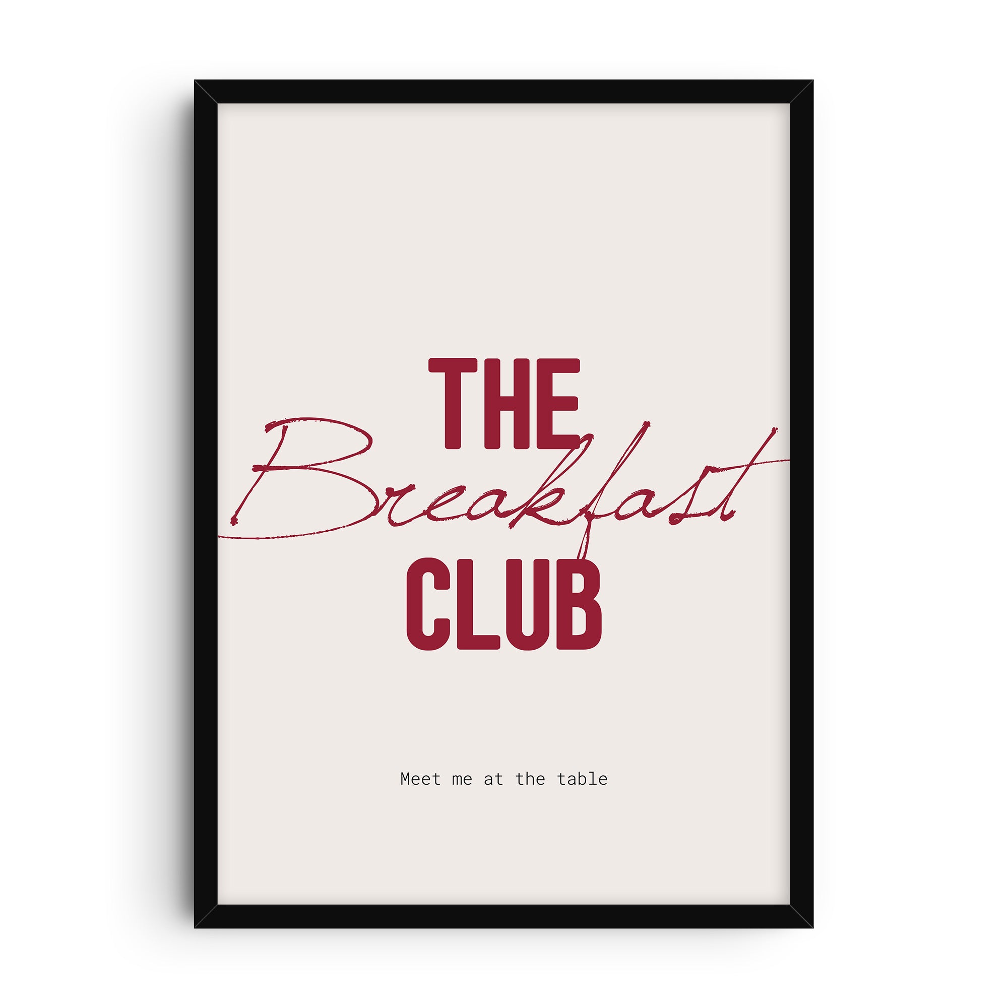 Minimalist typography art print with the phrase “The Breakfast Club” in bold red letters, a handwritten script overlay, and the text “Meet me at the table” below on a light background.