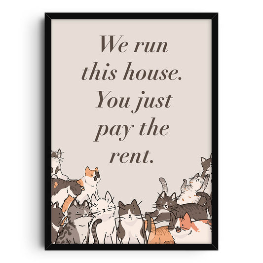 A beige-toned art print with the phrase We run this house. You just pay the rent. in a classic serif font, surrounded by illustrated cats in various poses, adding a humorous and cozy feline touch.