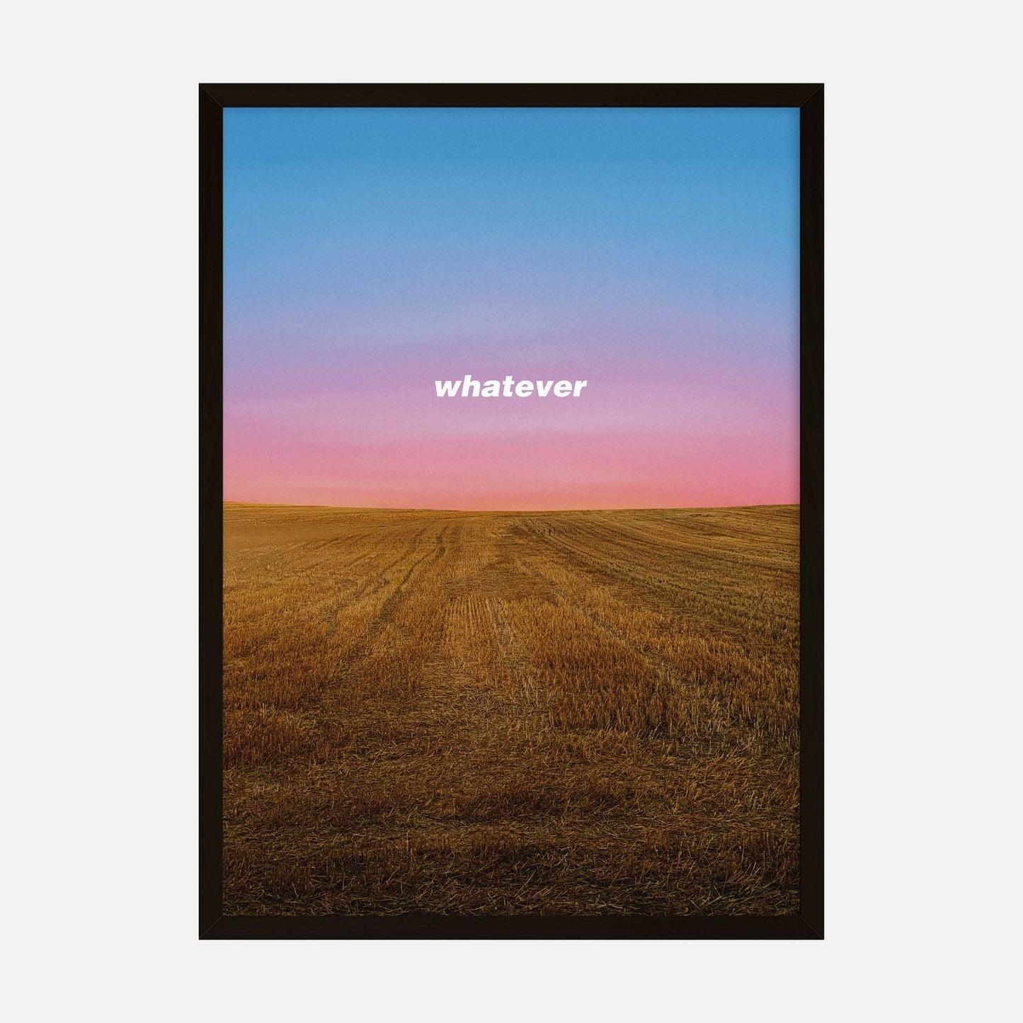 Minimalist wheat field art print with the word 'whatever' over a sunset landscape.