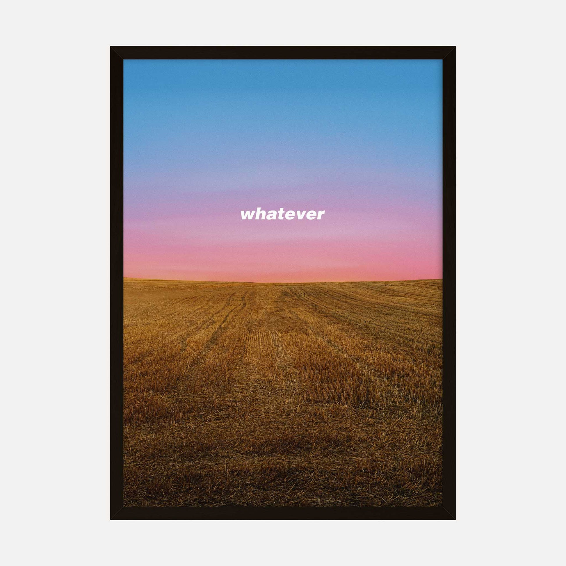 Minimalist wheat field art print with the word 'whatever' over a sunset landscape.